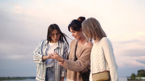 Young women using voice recognition search function on