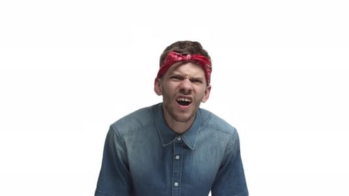 Man Yelling and Displaying Shock Against White Background