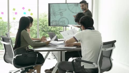 Business Team Collaborating in Modern Office Meeting