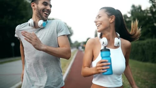 Beautiful Couple Jogging and Fitness Training Outdoor