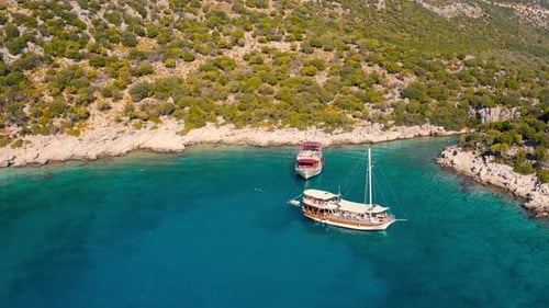 Old Tourist Ship on the Background of a Mountain Landscape on the Mediterranean Sea