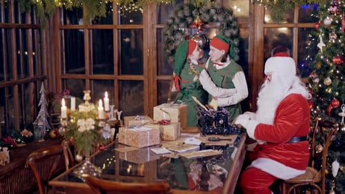 Children Dressed as Elves Dance with Santa Claus