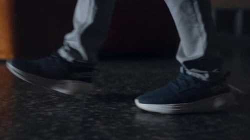 Closeup Student Legs Walking on Marble School Floor
