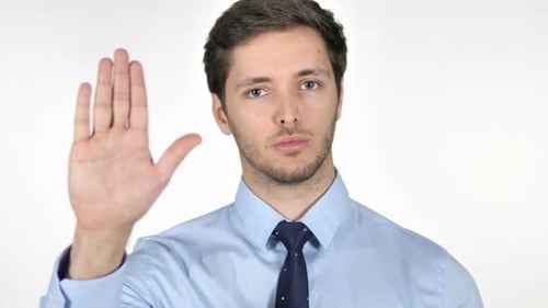Man Makes Stop Gesture on White Background