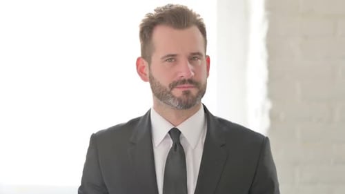 Adult Male Portrait in Dark Business Suit