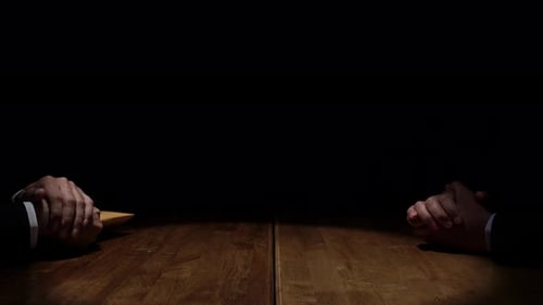 Suspicious Envelope Exchange Under Spotlight