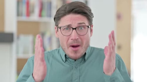 Upset Adult Man Yelling Indoors