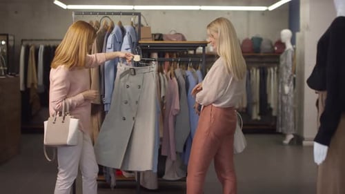 Women Looking at Clothing at a Boutique