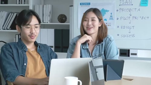 Asian colleague male and female friend casual dress meeting