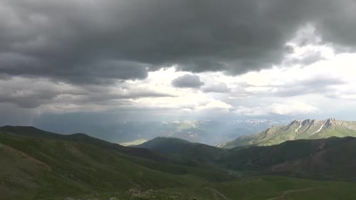 Dramatic Mountains Landscape Under Cloudy Sky