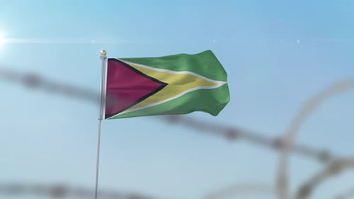 Guyana Flag Waving with Barbed Wire for National Identity