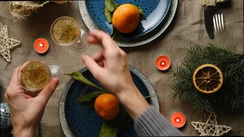 Festive Table Setting with Tangerines and Sparkling Wine