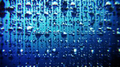 Abstract Shimmering Water Droplets Blue Background Seamless Loop