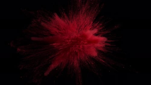 Red Powder Explosion on Black Background