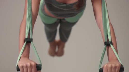 Woman Doing Aerial Yoga Inside