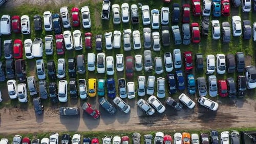 Lot of land with cars cars vehicles colorful old unusable abandoned