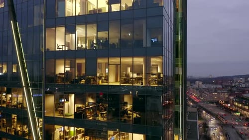 Office Windows in Skyscrapers City International Business Center at Night