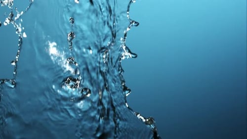 Water pouring and splashing in ultra slow motion 1500fps on a reflective surface - WATER POURS