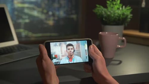 Online Business Meeting on Smartphone with Multiracial Coach