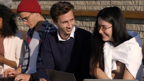 Young Adults Working with Technology Outdoors
