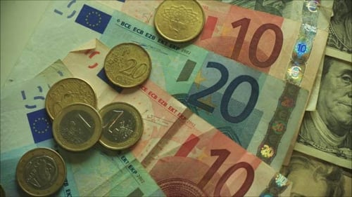 Euro and Dollar Bills and Coins