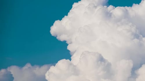 Timelapse of White Puffy Cumulus Clouds Forming on Summer Blue Sky