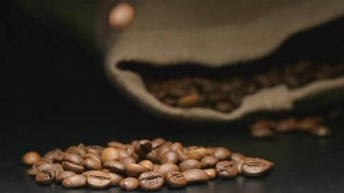 Pile of Coffee Beans with Falling Coffee Beans