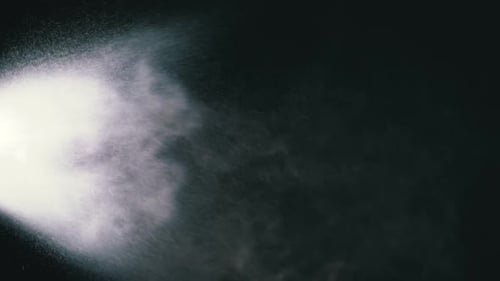 Abstract Water Spray Particles on Dark Background