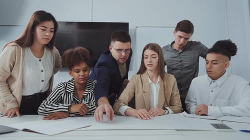 Young Adults Working Together on a Business Project