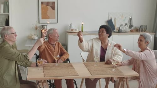 Senior Friends Holding Bengal Lights