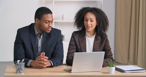 Woman Lawyer Manager Consults Afro American Business Man in Office Colleagues Discussing Project