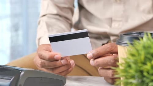 Payment Terminal Charging From a Card, Contactless Payment.