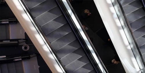 Elevated View of Escalators in Busy Urban Setting