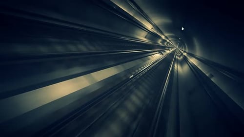 Seamless subway journey through the modern underground empty railway tunnel.