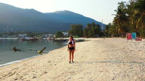 Pretty happy ladies travelling by the sea on beach on paradise white sand and blue background 4K