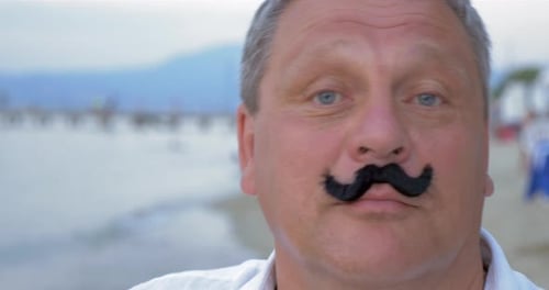 Senior Man with Fake Mustache