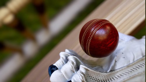 Rotating Red Cricket Ball and Glove