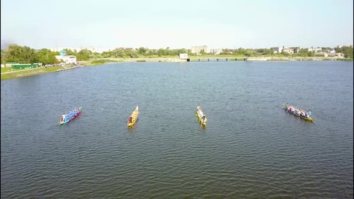 Close Up of a Men's Rowing Team at the Beginning of Their Race