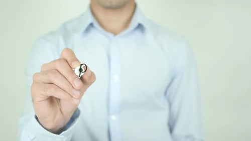 Man Writes Pre-Order on Clear Surface