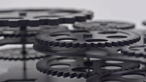 Black Gears Turning in Coordinated Mechanical System