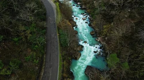 Picturesque Mountain River Flowing in a Gorge Among Picturesque Rocks