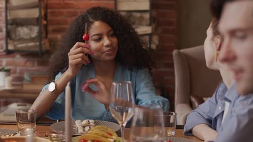 Friends Dining Together in Restaurant