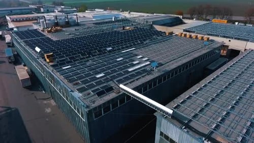 Solar Panels or Solar Cells on Factory Rooftop