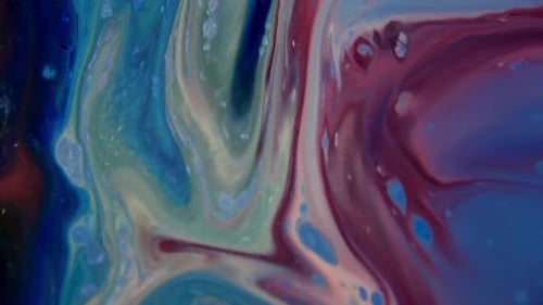 Bunte Chaos-Tinte, die sich in flüssigen Turbulenzen