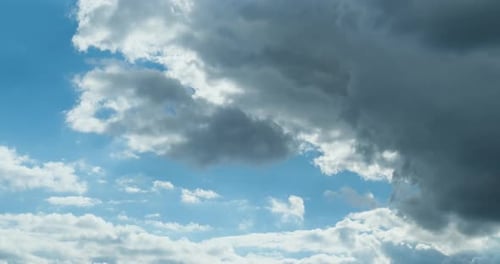 Moving Clouds in Bright Blue Sky Time Lapse