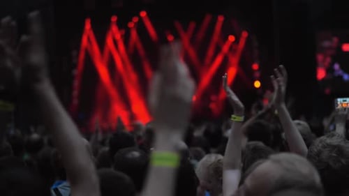 Concert Audience Clapping at a Music Event