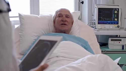 Elderly Patient Discussing Brain Scan with Doctor