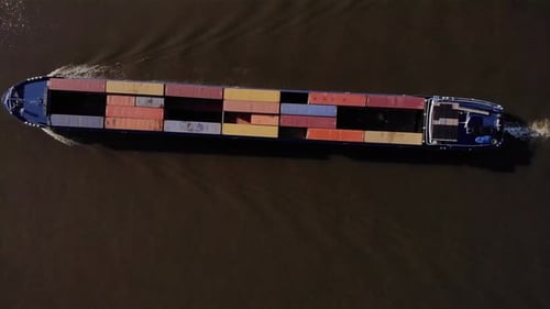 Cargo Ship Sailing with Colorful Shipping Containers