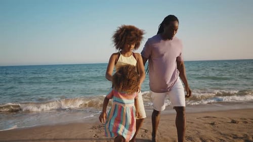 Happy family spending the day at the beach.