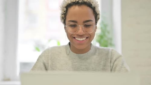 Close Up of African Woman Talking on Video Call on Laptop